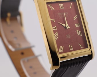 Vintage Seiko Quartz Watch: Slim Rectangle, Red Dial, Leather Strap