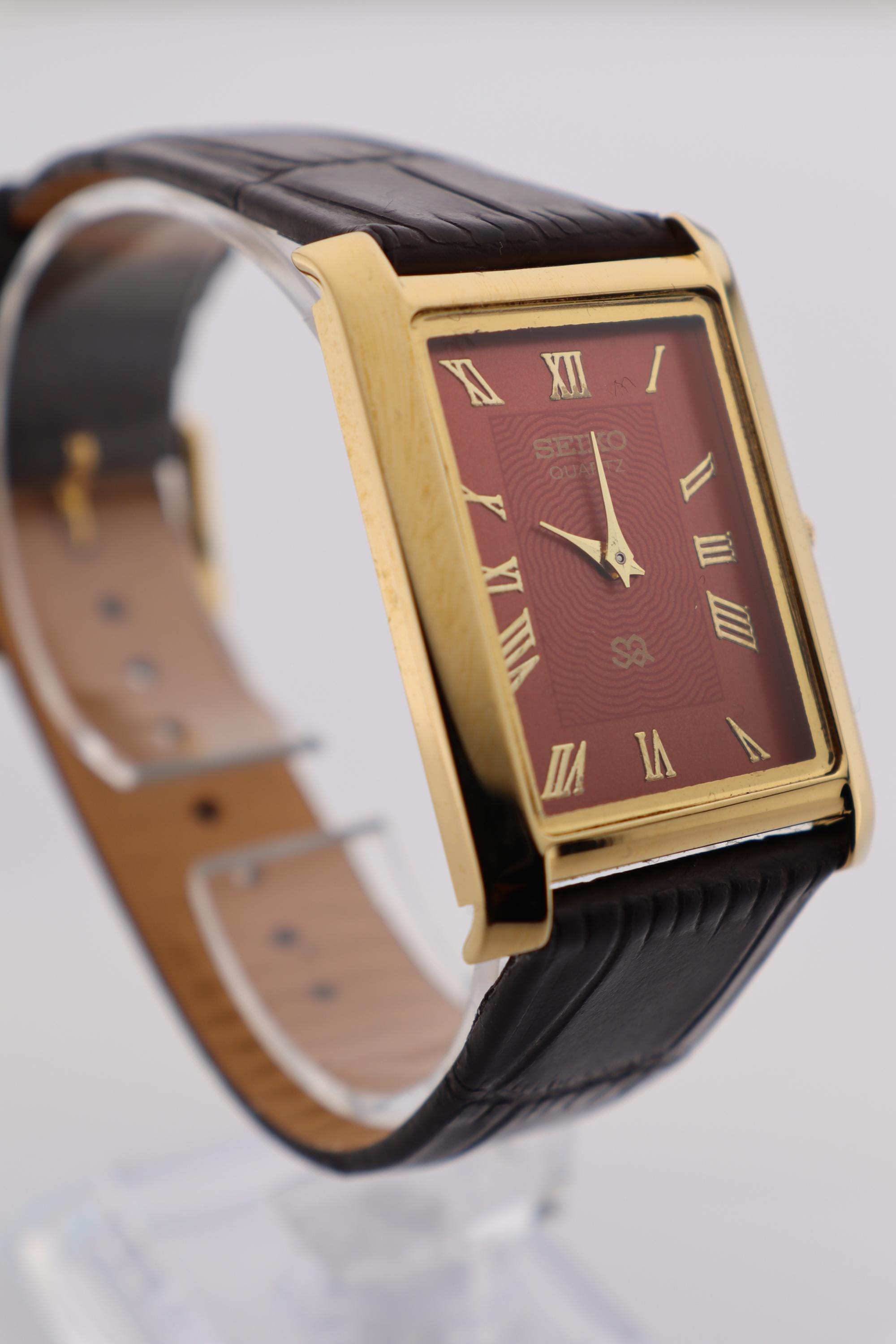 Vintage Seiko Quartz Watch: Slim Rectangle, Red Dial, Leather