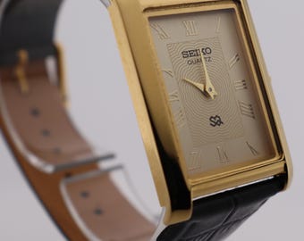 Nieskazitelny męski zegarek na rękę Seiko Slim Vintage Quartz z nowym czarnym skórzanym paskiem