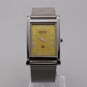 Carried through generations Vintage Seiko Slim Quartz Men&#39;s  Wrist Watch Yellow Dial - Silver Case