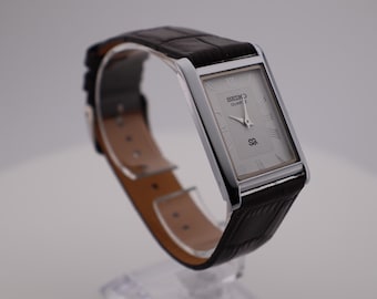 Vintage Seiko Quartz herrklocka: Vit urtavla, brunt läderarmband
