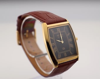 Vintage Seiko Tank Watch: Slim Barrel, Black Dial, Camel Leather