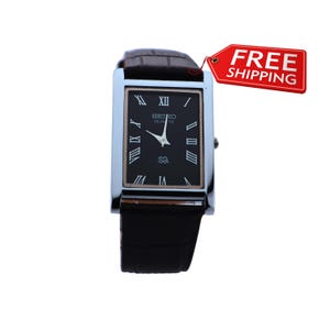 Vintage Seiko Quartz Watch: Black Dial, Slim Tank, Leather Strap