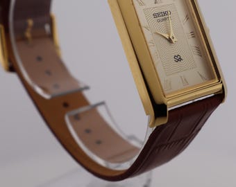 希少なドレススタイル セイコー スリム ヴィンテージ クォーツ メンズ腕時計 ゴールド文字盤
