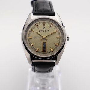 Authentiek vintage automatisch Ricoh herenhorloge – 21 juwelen, dag/datum, made in Japan