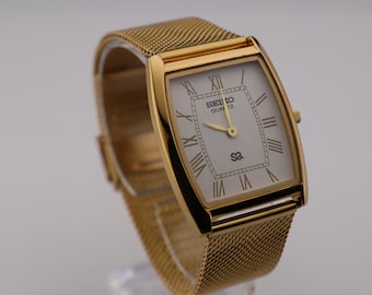 The gentleman’s choice Seiko Slim Vintage Barrel Tank  Quartz Men's  Wrist Watch White Dial - Gold Case