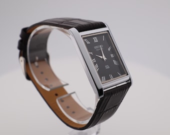 Vintage Seiko Quartz Watch: Black Dial, Slim Tank, Leather Strap