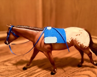 A “blue velvet” Breyer horse western tack set