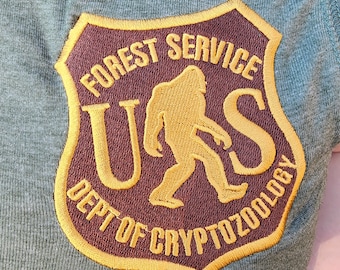 US Forest Department of Cryptozoology Hooded Zippered Vest