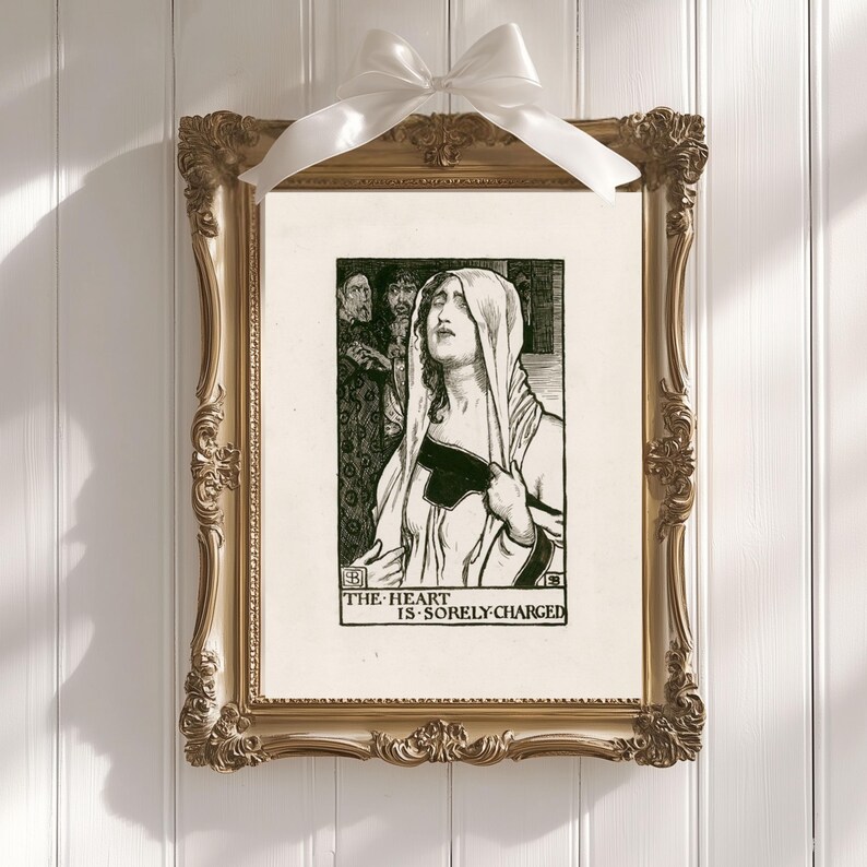 May include: A black and white illustration of a woman in a hooded cloak, with the text "THE HEART IS SORELY CHARGED" below. The illustration is framed in a gold frame.