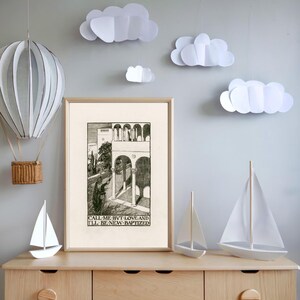 May include: Black and white print of an architectural scene with the text "CALL ME BUT LOVE AND I'LL BE NEW-BAPTIZED". The print is framed and hanging on a wall with white paper clouds hanging from the ceiling.