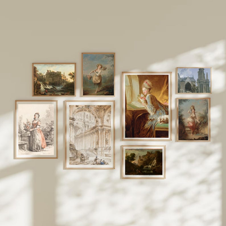 May include: A gallery wall with nine framed prints featuring various scenes, including a woman in a garden, a woman in a dress, a woman in a white dress, a building with an archway, a building with a courtyard, a woman in a blue dress, a woman in a white dress, a building with a courtyard, and a building with a courtyard.