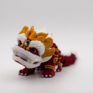 3D Printed Chinese Lion Figurine: Red and Gold Lunar New Year Decor
