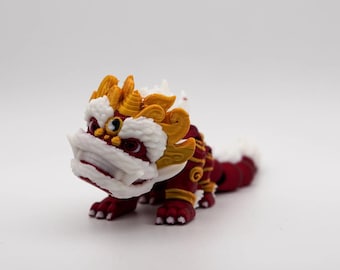 Figura de león chino impresa en 3D: decoración roja y dorada para el Año Nuevo Lunar.