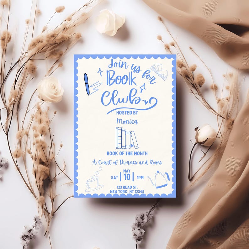 May include: A cream-coloured invitation with a blue scalloped border, advertising a book club hosted by Monica. The text "Join us for Book Club" is in blue script. The book of the month is "A Court of Thorns and Roses".