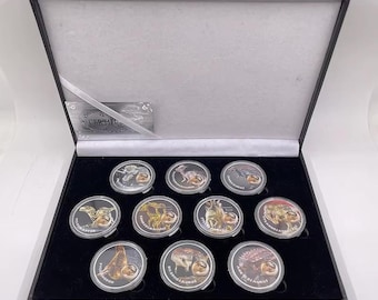 Juego de monedas de dinosaurio jurásico - Monedas coleccionables plateadas - Caja de regalo