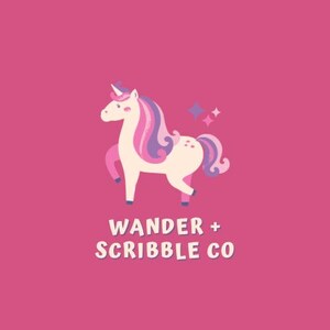 May include: A pink and purple unicorn with a horn and a sparkly tail. The unicorn is standing on a pink background. The text "Wander + Scribble Co" is below the unicorn.