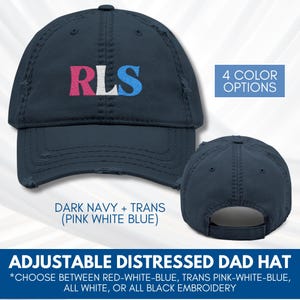 May include: A dark navy distressed dad hat with the embroidered letters "RLS" in pink, white, and blue. The hat has a pre-worn look and the text "4 COLOR OPTIONS" is visible. The text "ADJUSTABLE DISTRESSED DAD HAT" is also visible.