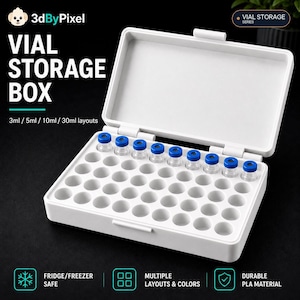May include: A white rectangular vial storage box with an open hinged lid. The interior features a grid of circular slots for vials, with nine small clear glass vials with blue caps inserted in the top row. Text includes VIAL STORAGE BOX.