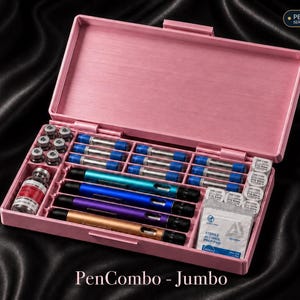 May include: A pink rectangular storage case labelled Pen Storage Series and PenCombo - Jumbo. The case contains four coloured pens, several small glass vials, multiple clear cartridges with blue caps, and a sterile alcohol prep pad packet.