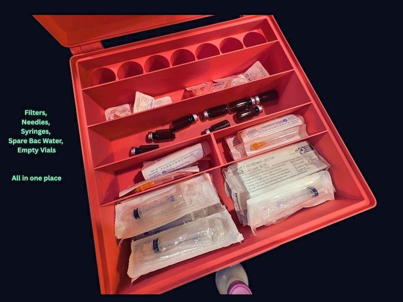 B12 injection supply organizer on deep indigo fabric backdrop