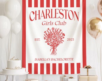 May include: A white banner with red vertical stripes on the edges and the text "CHARLESTON Girls Club" in red. Below the text is a floral bouquet illustration and the text "ISABELLA'S BACHELORETTE". White and gold balloons and gifts are in the background.