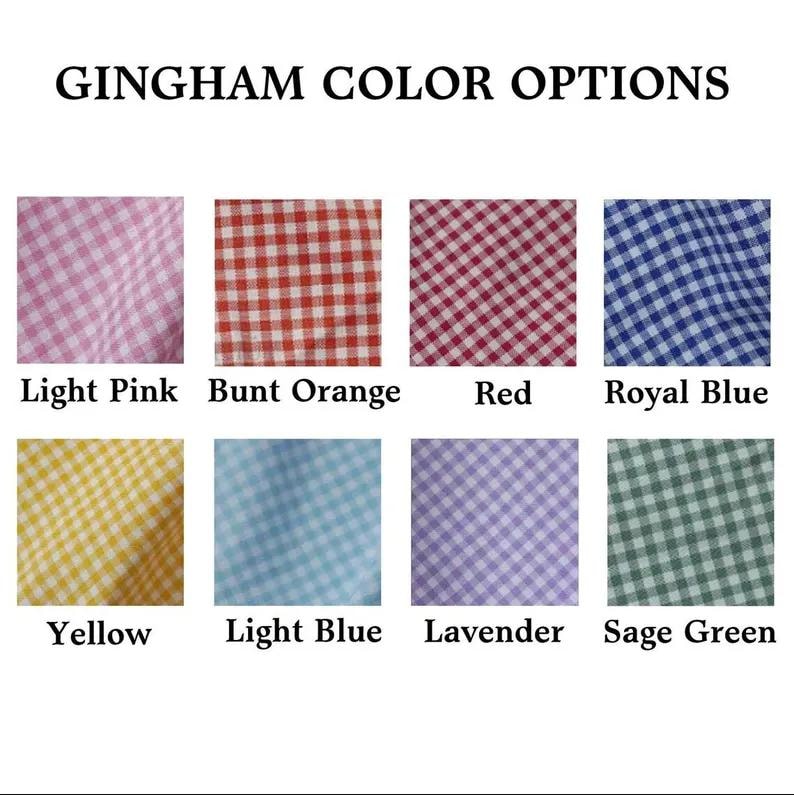 May include: Image showcasing eight gingham fabric color options. Colors include light pink, burnt orange, red, royal blue, yellow, light blue, lavender, and sage green. Text at the top reads "GINGHAM COLOR OPTIONS."