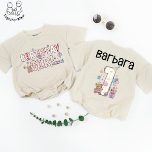 May include: A set of three ceramic mugs with a speckled, matte finish. The mugs are in shades of cream, light gray, and dark gray. Each mug has a simple, minimalist design, perfect for coffee or tea.