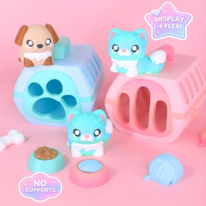 May include: A selection of pet-themed toys, featuring light blue and pink pet carriers, and small figurines of a dog and cats. Accessories include food bowls, a bone, and a ball of yarn. The image has text that says "DISPLAY + FLEXI" and "NO SUPPORTS".