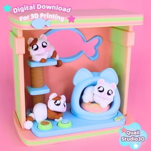 May include: A 3D printed cat playhouse structure featuring a multi-level tower, a cat-shaped cave, and two small cat figurines. The unit includes text reading Digital Download For 3D Printing and Quail Studio3D in a pastel color palette.