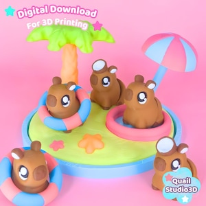 May include: A 3D digital model file for printing featuring four brown capybara figures on a small island with a palm tree and a beach umbrella. Two capybaras wear blue and pink striped swim rings. Text reads Digital Download For 3D Printing.