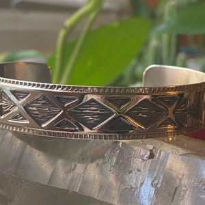 Patterned and stamped silver cuff bracelet