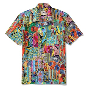 May include: Short-sleeved shirt with a vibrant patchwork design. The shirt features a colourful mix of geometric shapes, patterns, and abstract art in shades of red, yellow, blue, and green. A small label with a bird logo is visible on the collar.