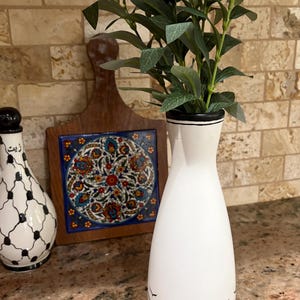 Hand painted 8”x2.75 ceramic vase with faux olive tree branch. White vase with keffiyeh Palestinian design.  Palestine house warming gift