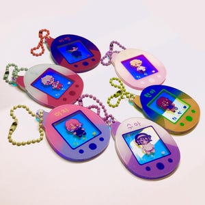 alien stage tamagotchi rainbow acrylic keychains