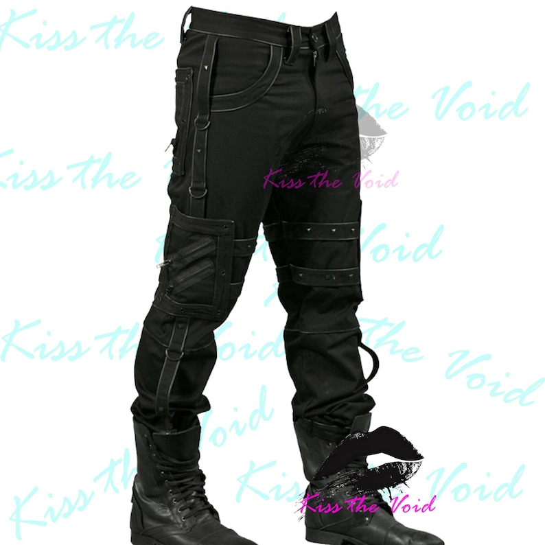 May include: Black denim pants with multiple pockets, straps, and silver-tone rivets. The pants have a unique design with visible stitching and are paired with black boots. The text "Kiss the Void" is visible in the image.