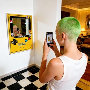 "Yellow and red retro gaming console wall mirror for bedroom decor".