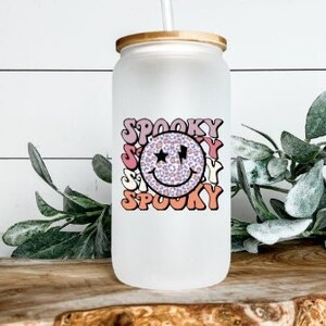 Halloween Spooky Retro Face Glass Can Cup with Bamboo Lid Straw Iced Coffee Pumpkin Spice Spooky Season Halloween Cup Aesthetic Pastel Ghost