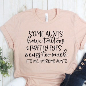 Some Aunts have tattoos pretty eyes thick thighs cute aunt shirt promoted to aunt Tattooed aunt best friend