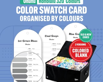 May include: A color swatch card for Ohuhu Honolulu 320 Colors, organized by color. The image shows a black carrying case filled with markers, along with color swatch cards labeled "Ice Green Blues," "Cool Greys," and "Blue Greys." The text "COLORED BLANK" is visible.