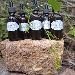 Organic Herbal Tinctures: Bee Balm, Feverfew, or Sassafras. 2fl oz in amber glass.