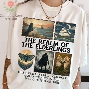 May include: Cream-colored t-shirt featuring a design with postage stamp-style illustrations. The stamps depict a wolf, a ship, a moth, a figure with a sword, and a deer. Text on the shirt reads "THE REALM OF THE ELDERLINGS" and a quote.