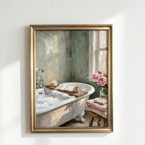 May include: A framed painting shows a tranquil bathroom interior. A clawfoot bathtub with bubbles holds a wooden tray with a book, candle, and mug. Pink towels are stacked on a stool, and a vase of pink flowers sits by a window.