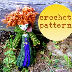 May include: Crochet pattern for a green and purple doll with red curly hair. The doll is wearing a green hooded cloak with gold embroidery and a purple skirt. The doll is sitting on a wooden log with a yellow circle behind it that says "crochet pattern".