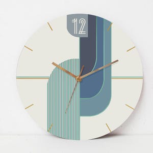 May include: A white round clock with gold hands and a blue and green geometric design. The clock face has the number 12 printed on it.