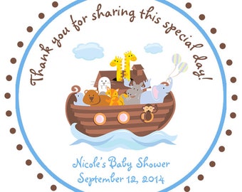 May include: A round baby shower sticker with a blue and brown border. The sticker features an illustration of Noah's Ark with various animals. Text reads "Thank you for sharing this special day!" and "Nicole's Baby Shower September 12, 2014."