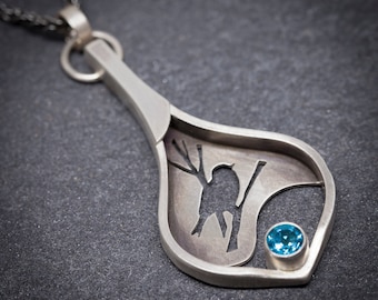 Silverwing | Sweet songbird pendant with long bail & blue topaz gemstone