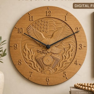 May include: A round wooden wall clock featuring a carved American flag, a bald eagle, and a V-twin engine with flames. The clock face has black hands and raised numerals from 1 to 12. Text at the top reads STL | CNC | 3D Print and DIGITAL FILE.