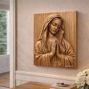 May include: A wooden relief carving of a woman with her hands clasped in prayer. The artwork is mounted on a rectangular wooden panel and is a warm, natural wood tone. The artist's mark, "cnwoooco", is visible on the lower right.