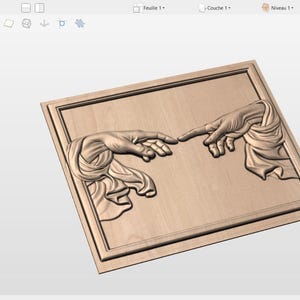 May include: A wooden relief carving depicting Michelangelo's "The Creation of Adam" from the Sistine Chapel. The artwork shows two hands nearly touching, set within a rectangular frame. The carving is in a light brown color.
